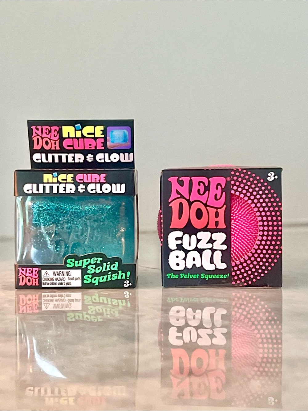 NeeDoh Fuzz Ball + Nice Cube Glitter & Glow Set - Blue & Pink Set of 2 Bundle
